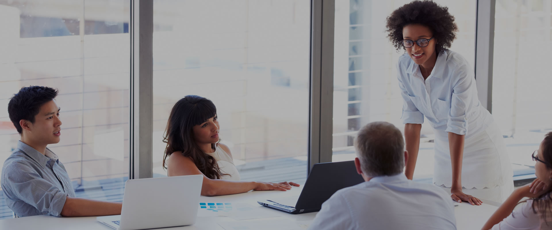 A group of people having a meeting